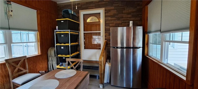 26 Morton Ave, Johnston, RI 02919 - kitchen featuring freestanding refrigerator and wood walls