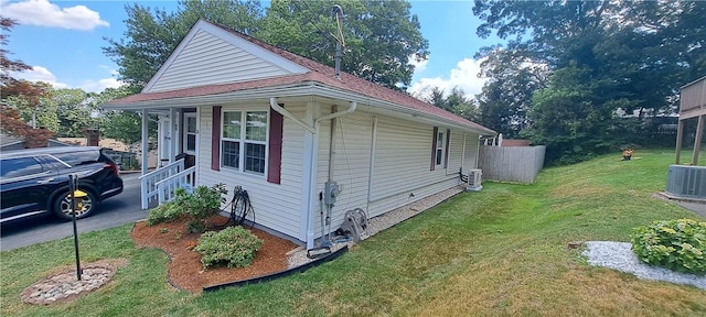 26 Morton Ave, Johnston, RI 02919 - view of side of property with a lawn and a porch
