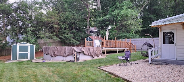 26 Morton Ave, Johnston, RI 02919 - fenced backyard with a shed and a wooden deck