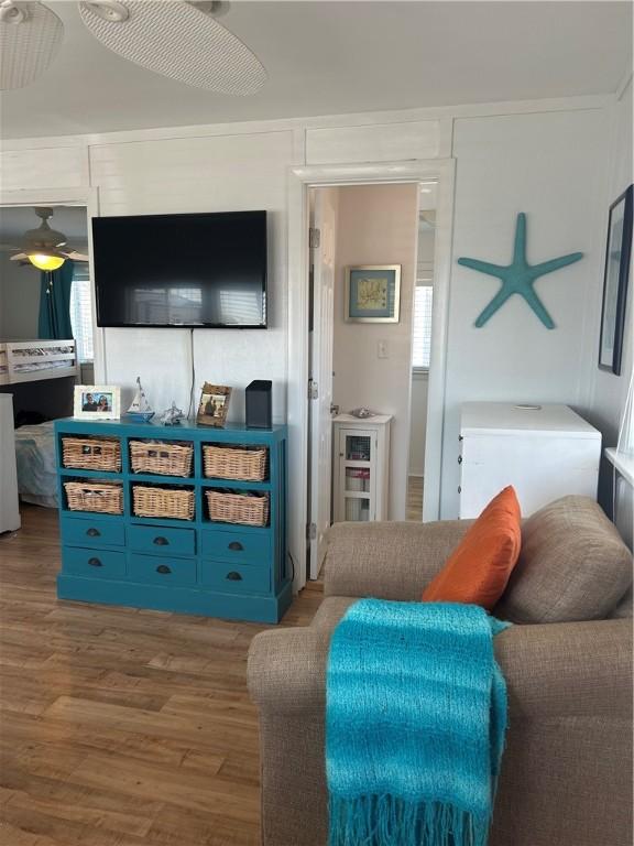 854 Matunuck Beach Rd, South Kingstown, RI 02879 - living room featuring wood finished floors and a ceiling fan