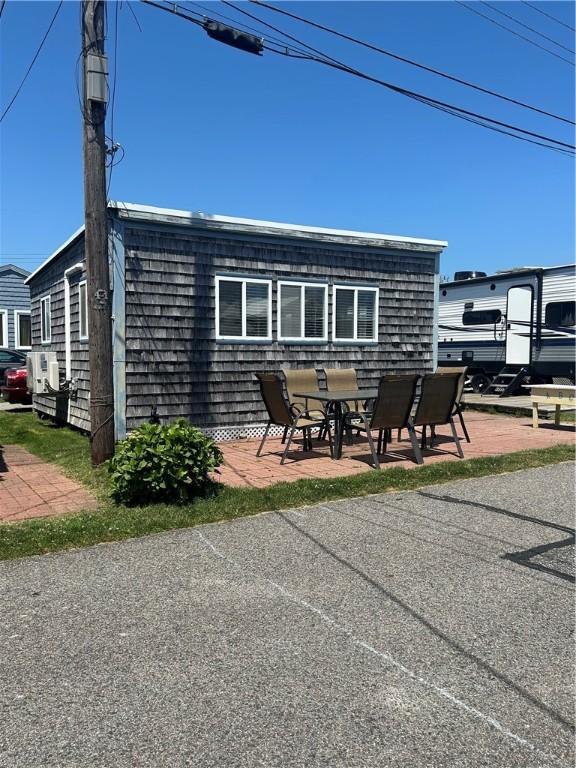 854 Matunuck Beach Rd, South Kingstown, RI 02879 - view of patio / terrace with outdoor dining space