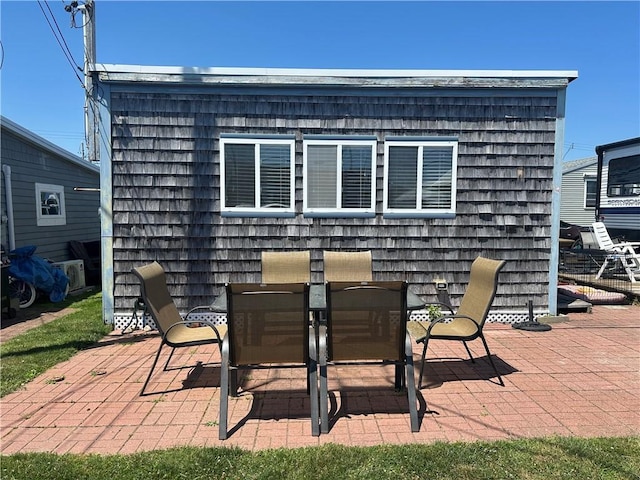 854 Matunuck Beach Rd, South Kingstown, RI 02879 - view of patio / terrace with outdoor dining area