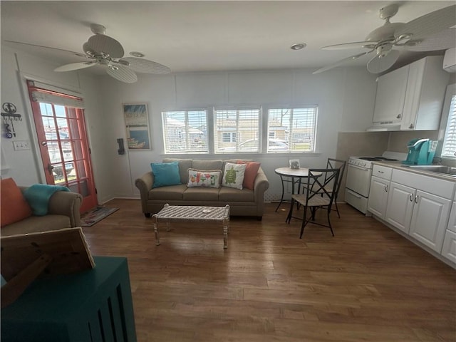 854 Matunuck Beach Rd, South Kingstown, RI 02879 - living room featuring a ceiling fan and wood finished floors