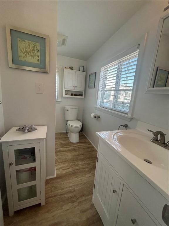 854 Matunuck Beach Rd, South Kingstown, RI 02879 - bathroom with vanity and wood finished floors