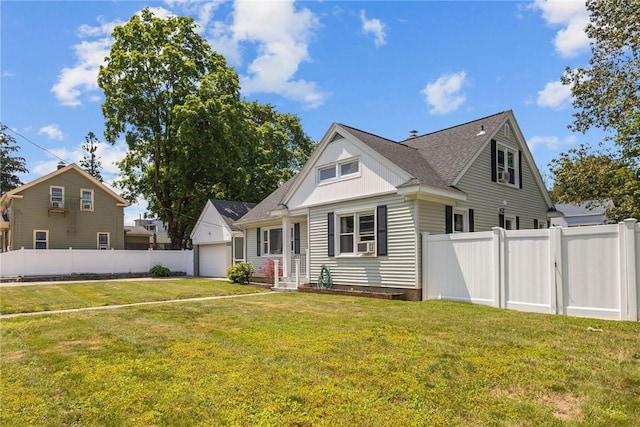 58 E St, West Warwick, RI 02893 - view of front of home with entry steps, a detached garage, and cooling unit