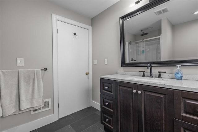 58 E St, West Warwick, RI 02893 - bathroom featuring vanity, tile patterned floors, and a shower