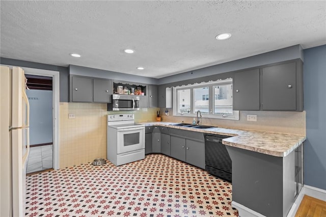 58 E St, West Warwick, RI 02893 - kitchen featuring white appliances, gray cabinets, light countertops, a textured ceiling, and open shelves