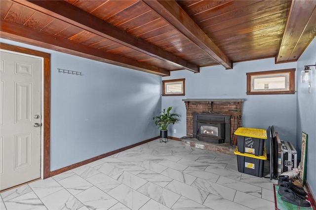 58 E St, West Warwick, RI 02893 - living room with a wood ceiling with exposed beams, marble look tile flooring, and a fireplace