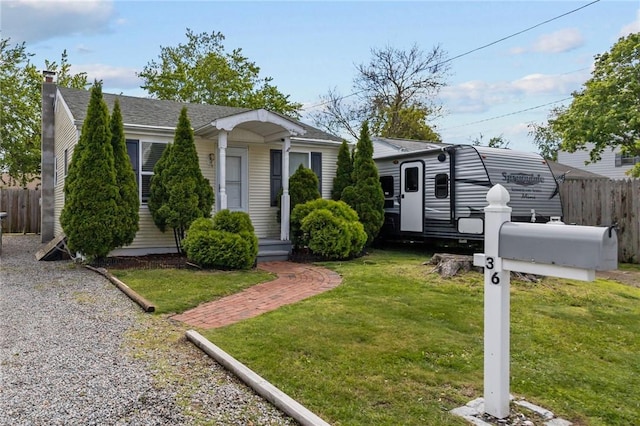 36 Dundas Ave, Warwick, RI 02889 - view of front of home with a chimney