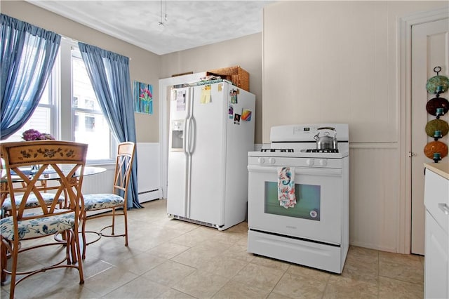 11 Branch Ave, Cranston, RI 02910 - kitchen featuring white appliances, a baseboard radiator, and a decorative wall