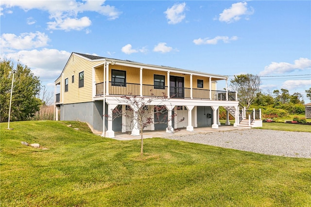 212 Round Pond Rd, Little Compton, RI 02837 - rear view of house with a lawn and stairs