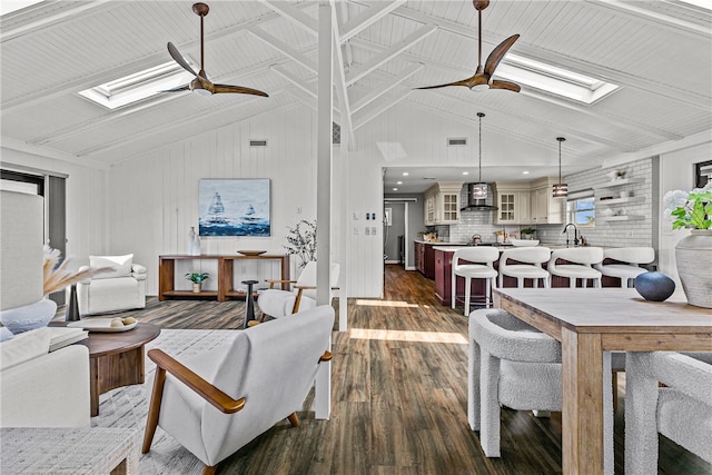 212 Round Pond Rd, Little Compton, RI 02837 - living area featuring a skylight, ceiling fan, and dark wood finished floors