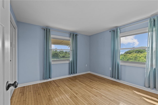 212 Round Pond Rd, Little Compton, RI 02837 - unfurnished room with light wood-type flooring and baseboards