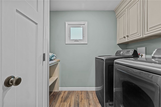 212 Round Pond Rd, Little Compton, RI 02837 - laundry room with washer and clothes dryer, cabinet space, and wood finished floors