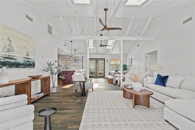 212 Round Pond Rd, Little Compton, RI 02837 - living area with high vaulted ceiling, dark wood-style flooring, and ceiling fan