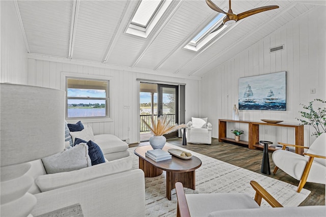 212 Round Pond Rd, Little Compton, RI 02837 - living room featuring wood finished floors, a skylight, ceiling fan, and wood walls