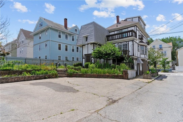 129 Academy Ave, Providence, RI 02908 - back of property with a balcony