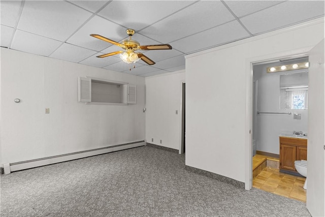 129 Academy Ave, Providence, RI 02908 - carpeted spare room with a baseboard heating unit, ceiling fan, a paneled ceiling, and a wall mounted air conditioner