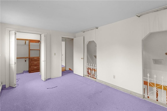 129 Academy Ave, Providence, RI 02908 - unfurnished bedroom featuring carpet flooring and a closet