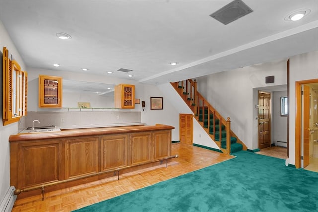 129 Academy Ave, Providence, RI 02908 - bar with baseboard heating, stairs, and recessed lighting