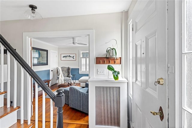 47 Second St, Newport, RI 02840 - entrance foyer featuring light wood finished floors, stairs, ceiling fan, and ornamental molding