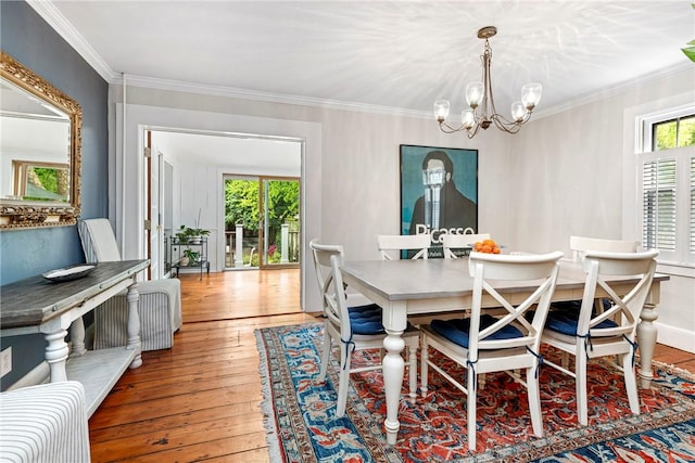 47 Second St, Newport, RI 02840 - dining room with a chandelier, plenty of natural light, hardwood / wood-style flooring, and crown molding
