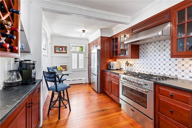 47 Second St, Newport, RI 02840 - kitchen with stainless steel appliances, extractor fan, light wood-type flooring, a baseboard heating unit, and ornamental molding