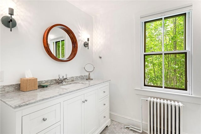 47 Second St, Newport, RI 02840 - bathroom with radiator heating unit and vanity
