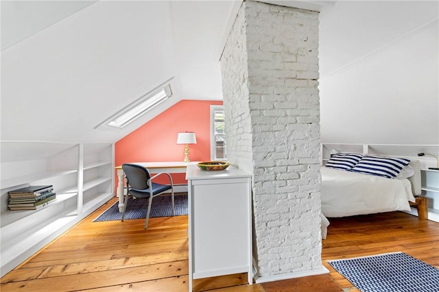 47 Second St, Newport, RI 02840 - bedroom featuring wood-type flooring, vaulted ceiling, a skylight, and a desk