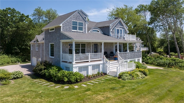 170 W Beach Rd, Charlestown, RI 02813 - shingle-style home featuring covered porch, a front yard, driveway, and a shingled roof
