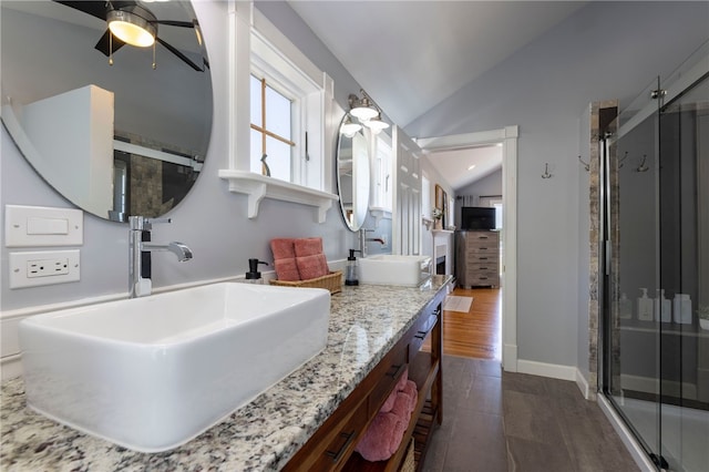 170 W Beach Rd, Charlestown, RI 02813 - bathroom featuring lofted ceiling, a stall shower, double vanity, and ceiling fan
