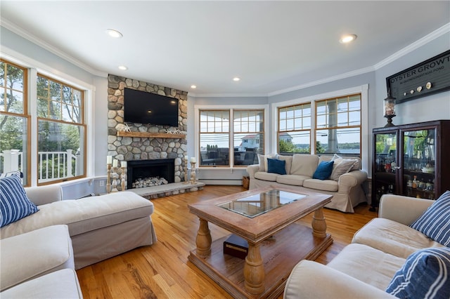 170 W Beach Rd, Charlestown, RI 02813 - living room featuring ornamental molding, plenty of natural light, a fireplace, recessed lighting, and wood finished floors