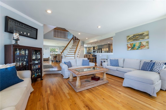 170 W Beach Rd, Charlestown, RI 02813 - living room with stairway, ornamental molding, wood finished floors, recessed lighting, and a chandelier