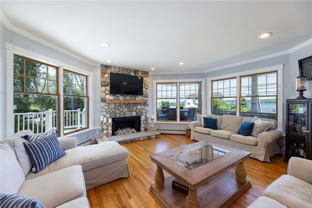 170 W Beach Rd, Charlestown, RI 02813 - living room featuring ornamental molding, a fireplace, light wood finished floors, recessed lighting, and baseboard heating