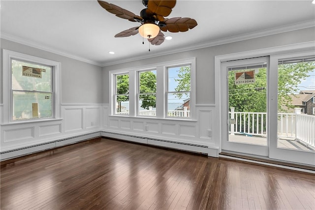 201 Bellman Ave, Warwick, RI 02889 - empty room with a wainscoted wall, dark wood-style flooring, ornamental molding, a baseboard heating unit, and a decorative wall