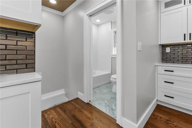 201 Bellman Ave, Warwick, RI 02889 - bathroom with wood finished floors, backsplash, recessed lighting, and a bathtub