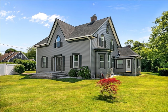 93 E Main Rd, Portsmouth, RI 02871 - rear view of property featuring a chimney and roof with shingles