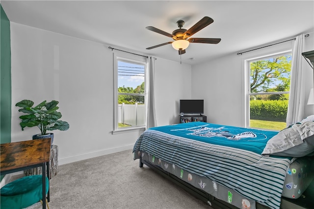 93 E Main Rd, Portsmouth, RI 02871 - bedroom featuring multiple windows, carpet, and ceiling fan