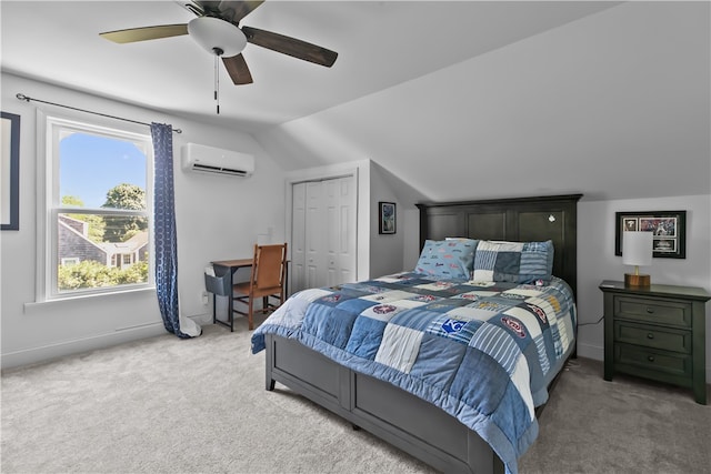93 E Main Rd, Portsmouth, RI 02871 - carpeted bedroom with an AC wall unit, vaulted ceiling, multiple windows, a ceiling fan, and a closet
