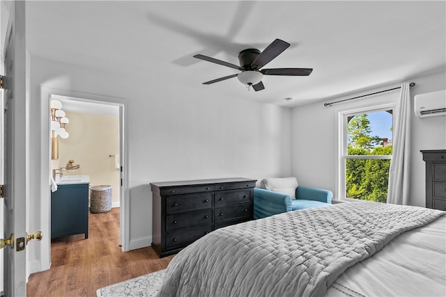 93 E Main Rd, Portsmouth, RI 02871 - bedroom featuring wood finished floors, a wall mounted air conditioner, and ceiling fan