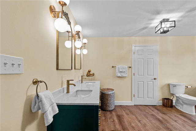 93 E Main Rd, Portsmouth, RI 02871 - bathroom with double vanity and wood finished floors