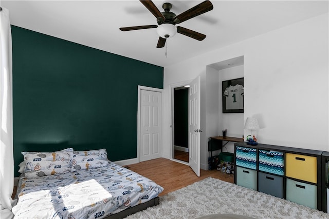 93 E Main Rd, Portsmouth, RI 02871 - bedroom with a ceiling fan and wood finished floors