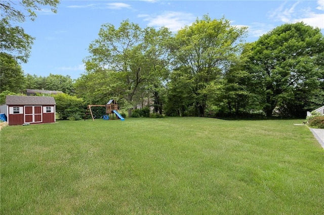 43 Shannock Hill Rd, Richmond, RI 02812 - view of grassy yard featuring a storage shed and a playground
