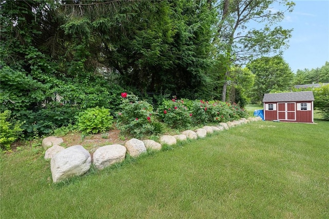 43 Shannock Hill Rd, Richmond, RI 02812 - view of green lawn with a storage unit