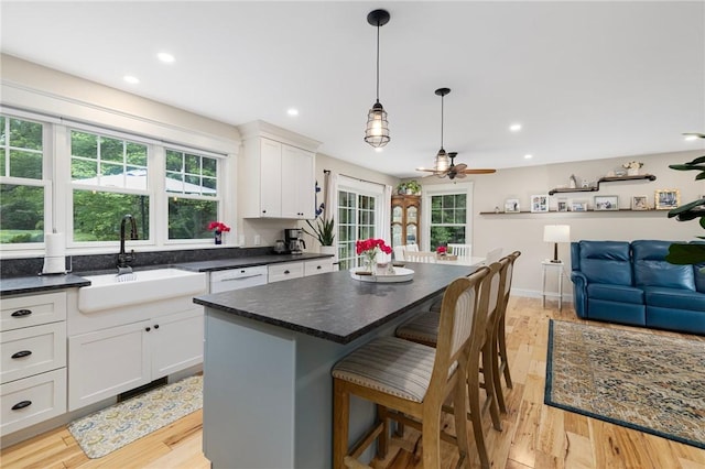 43 Shannock Hill Rd, Richmond, RI 02812 - kitchen with a ceiling fan, white cabinets, healthy amount of natural light, light wood-style flooring, and recessed lighting