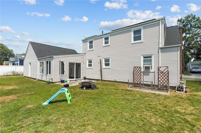 56 Brookfield Dr, Cranston, RI 02920 - back of property featuring a fire pit
