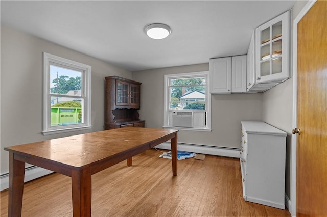 56 Brookfield Dr, Cranston, RI 02920 - home office with a baseboard heating unit, cooling unit, and light wood-style floors