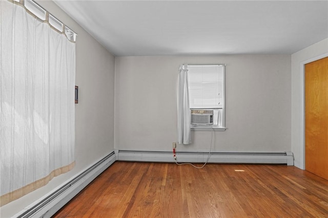 56 Brookfield Dr, Cranston, RI 02920 - empty room featuring a baseboard radiator, wood finished floors, and cooling unit