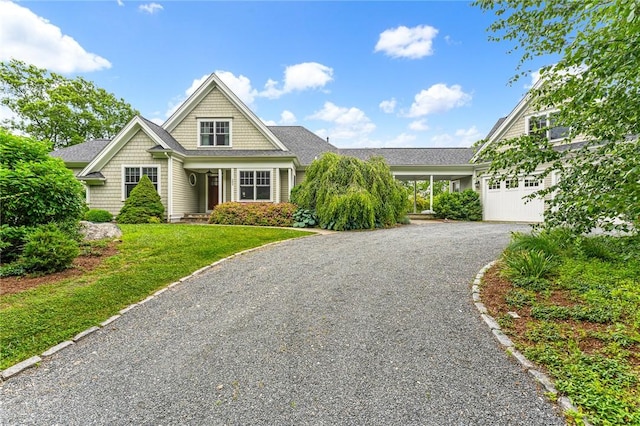 583 Highland Rd, Tiverton, RI 02878 - view of front of house with driveway and a front lawn