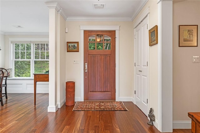583 Highland Rd, Tiverton, RI 02878 - foyer with dark wood-style flooring, plenty of natural light, and crown molding